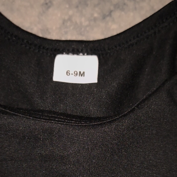 Stylish Black Graphic Bodysuit for Kids - Picture 2 of 4